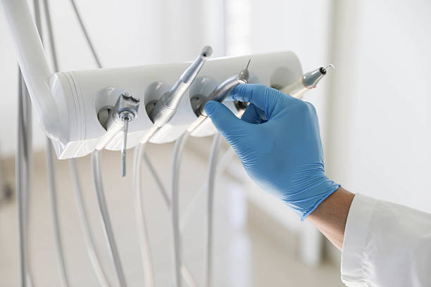 Professional Tooth Extraction technician working in Cockrell Hill, TX
